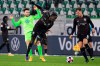 Wolfsburg's Renato Steffen, left, plays against Stuttgart's Silas Wamangituka, center, and Pascal Stenzel during the German Bundesliga soccer match between VfL Wolfsburg and VfB Stuttgart at Volkswagen Arena in Wolfsburg, Germany, Sunday, Dec. 20, 2020. (Swen Pf'rtner/dpa via AP)