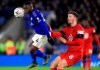 Wigan Athletic's Lee Evans, right, and Leicester City's Nampalys Mendy battle for the ball during their English FA Cup third round soccer match at The King Power Stadium, Leicester, England, Saturday, Jan. 4 2020. (Mike Egerton/PA via AP)