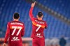 Roma's Lorenzo Pellegrini, right, celebrates after scoring during the Italian Serie A soccer match between Roma and Torino at Rome’s Olympic stadium Thursday, Dec. 17, 2020. (Fabio Rossi/LaPresse via AP)