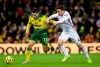 Norwich City's Emi Buendia, left, and Sheffield United's John Fleck battle for the ball during their English Premier League soccer match at Carrow Road, Norwich, England, Sunday, Dec. 8, 2019. (Joe Giddens/PA via AP)