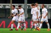 Benevento's Gianluca Lapadula, left, celebrates with teammates after scoring during the Serie A soccer match between Hellas Verona and Benevento, at the Bentegodi Stadium in Verona, northern Italy, Monday, Nov. 2, 2020. (Paola Garbuio/LaPresse via AP)