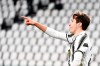 Juventus' Federico Chiesa celebrates after scoring during the Italian Serie A soccer match between Juventus and Spezia at the Allianz Stadium in Torino, Italy, Tuesday, March 2, 2021. (Marco Alpozzi/LaPresse via AP)