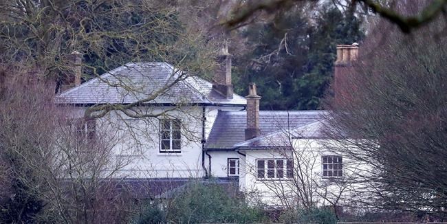 FILE - In this Jan. 4, 2020 file photo, Frogmore Cottage, the home of Prince Harry and Meghan, Duchess of Sussex, on the Home Park Estate, Windsor, England. Buckingham Palace says Prince Harry and his wife, Meghan, will no longer use the titles