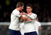 Tottenham Hotspur's Jan Vertonghen, left, restrains team-mate Dele Alli during a dispute over a quickly taken free-kick during the English Premier League soccer match between Tottenham Hotspur and AFC Bournemouth at Tottenham Hotspur Stadium, London, Saturday, Nov. 30, 2019. (John Walton/PA via AP)