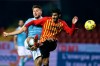Lazio's Ciro Immobile, left, scores his side's first goal of the game during the Italian Serie A soccer match between Benevento and Lazio, at the Vigorito stadium in Benevento, Italy, Tuesday, Dec. 15, 2020. (Alessandro Garofalo/LaPresse via AP)