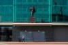 A baby buggy is pushed past the closed Manchester United stadium, Old Trafford, in Manchester, northern England, as the English Premier League soccer season has been suspended due to coronavirus, Thursday, April 9, 2020. The new coronavirus causes mild or moderate symptoms for most people, but for some, especially older adults and people with existing health problems, it can cause more severe illness or death. (AP Photo/Jon Super)