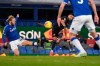 Manchester City's Riyad Mahrez, center, scores his side's second goal during the English Premier League soccer match between Everton and Manchester City at Goodison Park stadium, in Liverpool, England, Wednesday, Feb. 17, 2021. (Michael Regan/Pool via AP)