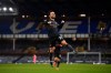 Manchester City's Bernardo Silva celebrates scoring his side's third goal during the English Premier League soccer match between Everton and Manchester City at Goodison Park stadium, in Liverpool, England, Wednesday, Feb. 17, 2021. (Michael Regan/Pool via AP)