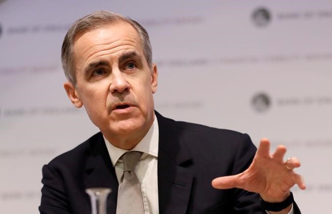 FILE - In this Monday, Dec. 16, 2019 file photo, Mark Carney, Governor of the Bank of England, speaks at a Bank of England Financial Stability Report Press Conference, in London. The Bank of England on Thursday Jan. 30, 2020, has opted against cutting interest rates after a run of fairly firm economic data in the past week eased fears about a dramatic slowdown in the British economy. The decision, which comes a day before the U.K. leaves the European Union, marks the final time that Mark Carney will be at the helm at the bank. He leaves in March, to be replaced by former deputy governor Andrew Bailey. (AP Photo/Kirsty Wigglesworth, pool, File)