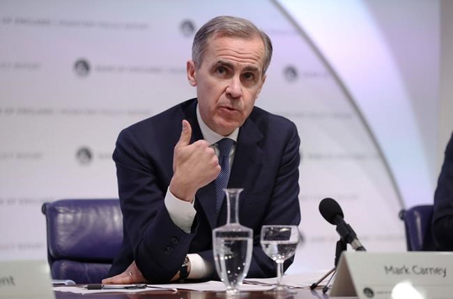 Mark Carney, Governor of the Bank of England speaks during the Bank of England's Monetary Policy Report news conference in the City of London, Thursday Jan. 30, 2020. The Bank of England on Thursday opted against cutting interest rates after a run of fairly firm economic data in the past week eased fears about a dramatic slowdown in the British economy. (Jonathan Brady/Pool via AP)