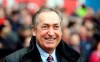 FILE - In this Sunday, Oct. 31, 2010 file photo, Aston Villa Gerard Houllier looks on before his team's English Premier League soccer against Birmingham City at Villa Park stadium, Birmingham, England. Gerard Houllier, a Frenchman who won three titles in one season as coach of English club Liverpool, has died. He was 73. Liverpool announced the death on Twitter on Monday Dec. 14, 2020. French sports daily L’Equipe said Houllier died following heart surgery in France. (AP Photo/Simon Dawson, File)