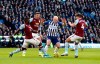 Brighton and Hove Albion's Aaron Mooy up against Aston Villa's Marvelous Nakamba, left, Jack Grealish and Danny Drinkwater, right, during the English Premier League soccer match between Brighton and Hove Albion and Aston Villa at the AMEX stadium, Brighton, England. Saturday, Jan. 18, 2020.(Gareth Fuller/PA via AP)