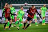 Wolfsburg's Maximilian Philipp and Frankfurt's Stefan Ilsanker, right, battle for the ball during the Bundesliga soccer match between Wolfsburg and Eintracht Frankfurt at Volkswagen Arena in Wolfsburg, Germany, Friday Dec. 11, 2020. (Swen Pf'rtner/dpa via AP)