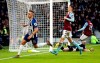 Brighton and Hove Albion's Leandro Trossard celebrates scoring his side's first goal of the game during the English Premier League soccer match between Brighton and Hove Albion and Aston Villa at the AMEX stadium, Brighton, England. Saturday, Jan. 18, 2020.(Gareth Fuller/PA via AP)