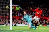 Manchester United's Marcus Rashford scores during the English Premier League soccer match between Manchester United and Norwich City at Old Trafford, Manchester, England, Saturday Jan. 11, 2020. (Martin Rickett/PA via AP)