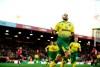Norwich City's Teemu Pukki celebrates scoring his side's first goal of the game during the English Premier League soccer match between Norwich City and Bournemouth at the Carrow Road Stadium, Norwich, England. Saturday, Jan. 18, 2020.(Joe Giddens/PA via AP)