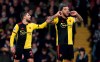 Watford's Troy Deeney, right, celebrates with Kiko Femenia after scoring against Aston Villa during the English Premier League soccer match at Vicarage Road, Watford, England, Saturday Dec. 28, 2019. (Tess Derry/PA via AP)
