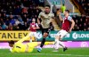 Manchester United's Anthony Martial, center, celebrates scoring against Burnley during the English Premier League soccer match at Turf Moor, Burnley, England, Saturday Dec. 28, 2019. (Martin Rickett/PA via AP)
