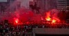 Liverpool soccer fans let off flares outside the Liver Building in Liverpool, England, Friday, June 26, 2020. Their team clinched the English Premier League title. Liverpool took the title after Manchester City failed to beat Chelsea on Wednesday evening. (Peter Byrne/PA via AP)