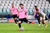 Lionel Messi of FC Barcelona scores a goal on penalty against Juventus F.C. during a group stage soccer match of UEFA Champions League in Turin, Italy, Oct. 28, 2020. (Marco Alpozzi/LaPresse via AP)