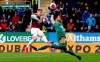 Bournemouth goalkeeper Aaron Ramsdale, right, saves a shot from Burnley's Matej Vydra during their English Premier League soccer match at Turf Moor in Burnley, England, Saturday Feb. 22, 2020. (Martin Rickett/PA via AP)
