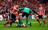 Sheffield United's Sander Berge, left, and Brighton and Hove Albion's Lewis Dunk during their cane against Sheffield, during their English Premier League soccer match at Bramall Lane in Sheffield, England, Saturday Feb. 22, 2020. (Tim Goode/PA via AP)