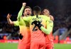 Manchester City's Gabriel Jesus, right, celebrates scoring his side's first goal of the game against Leicester with team mates Riyad Mahrez, centre, and Mota Bernardo Silva during their English Premier League soccer match at the King Power Stadium in Leicester, England, Saturday Feb. 22, 2020. (Nick Potts/PA via AP)