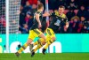 Southampton's Stuart Armstrong, left, celebrates scoring his side's second goal of the game against Crystal Palace, with team mate James Ward-Prowse, during their English Premier League soccer match at Selhurst Park in London, Tuesday Jan. 21, 2020. (Nigel French/PA via AP)