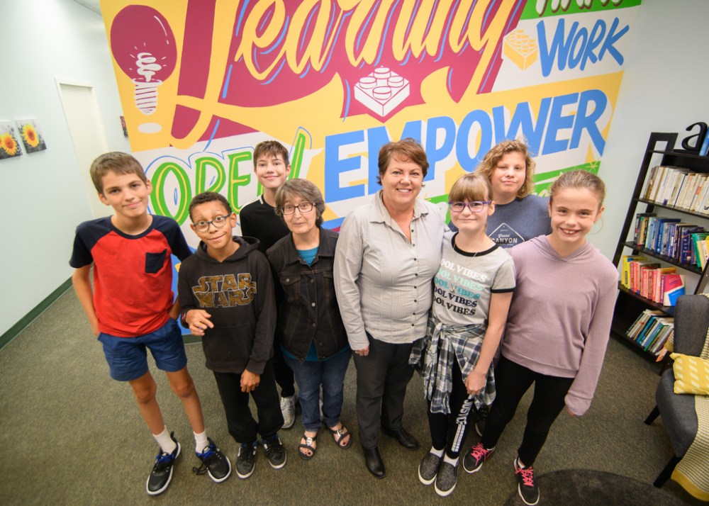 Learning Disability Association of Manitoba executive director Karen Velthuys (middle right, with some educators and students last year) says she has heard wait times for learning disability tests can be more than a year. (Mike Sudoma / Winnipeg Free Press files)
