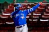Toronto Blue Jays' Teoscar Hernandez watches his three-run home run that broke a 2-2 tie during the 10th inning of the team's baseball game against the Boston Red Sox, Thursday Sept. 3, 2020, in Boston. (AP Photo/Charles Krupa)