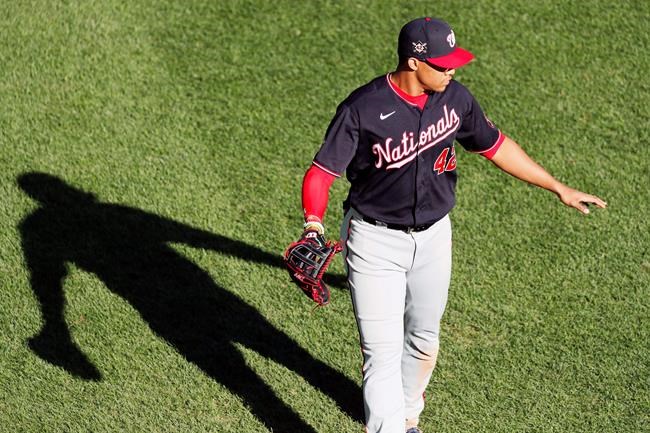 Washington Nationals' Juan Soto plays against the Boston Red Sox during the eighth inning of a baseball game, Sunday, Aug. 30, 2020, in Boston. (AP Photo/Michael Dwyer)