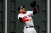 Boston Red Sox's Michael Chavis misses an RBI double by Baltimore Orioles' Rio Ruiz during the sixth inning of a baseball game Tuesday, Sept. 22, 2020, in Boston. (AP Photo/Michael Dwyer)