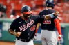 Washington Nationals' Howie Kendrick celebrates after scoring on a single by Adam Eaton during the third inning of a baseball game against the Boston Red Sox, Saturday, Aug. 29, 2020, in Boston. (AP Photo/Michael Dwyer)