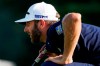 Dustin Johnson lines up a putt on the 10th green during the final round of the Northern Trust golf tournament at TPC Boston, Sunday, Aug. 23, 2020, in Norton, Mass. (AP Photo/Charles Krupa)