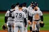 The New York Yankees' Brett Gardner, right, and teammates celebrate after defeating the Boston Red Sox in a baseball game, Saturday, Sept. 19, 2020, in Boston. (AP Photo/Michael Dwyer)