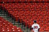 Boston Red Sox's Alex Verdugo watches as the ground-rule double by Tampa Bay Rays' Brandon Lowe goes into the empty stands during the seventh inning of a baseball game, Tuesday, Aug. 11, 2020, in Boston. (AP Photo/Michael Dwyer)