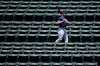 Boston Red Sox's Michael Chavis walks in the bleachers during baseball practice at Fenway Park, Sunday, July 5, 2020, in Boston. (AP Photo/Michael Dwyer)