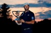 Dustin Johnson holds the trophy after winning the Northern Trust golf tournament at TPC Boston, Sunday, Aug. 23, 2020, in Norton, Mass. (AP Photo/Charles Krupa)