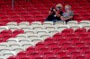 Stuttgart fans wait for the start of the German Bundesliga soccer match between VfB Stuttgart and SC Freiburg, Germany, Saturday, Sept. 19, 2020. 8500 spectators are allowed to watch the game in the stadium. (AP Photo/Matthias Schrader)