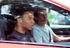 FC Bayern soccer club newcomer Leroy Sane, left, sits in a car as he leaves the FC Bayern training ground in Munich, Germany, July 2, 2020. FC Bayern newcomer Sane arrived in Munich the day before. (Matthias Balk/dpa via AP)