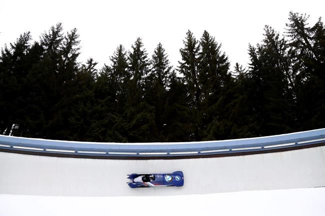 Elana Mayers Taylor and Sylvia Hoffmann of the United States speeds down the track during the two women's bobsleigh race at the Bobsleigh and Skeleton World Championships in Altenberg, Germany, Friday, Feb. 5, 2021. (AP Photo/Matthias Schrader)