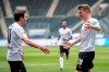Gladbach's Jonas Hofmann, left, and scorer Matthias Ginter celebrate after scoring during the German soccer Bundesliga match between Borussia Moenchengladbach and Eintracht Frankfurt in Moenchengladbach, Germany, Saturday, April 17, 2021 (Marius Becker/dpa via AP)