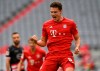 Munich's Benjamin Pavard celebrates his 2-0 after scoring during the German Bundesliga soccer match between FC Bayern Munich and Fortuna Duesseldorf in Munich, Germany, Saturday, May 30, 2020. Because of the coronavirus outbreak all soccer matches of the German Bundesliga take place without spectators. (Christof Stache/Pool via AP)