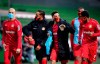 Leverkusen's players joke during the half-time break at the German Bundesliga soccer match between Werder Bremen and Bayer Leverkusen 04 in Bremen, Germany, Monday, May 18, 2020. The German Bundesliga becomes the world's first major soccer league to resume after a two-month suspension because of the coronavirus pandemic. (AP Photo/Stuart Franklin, Pool)
