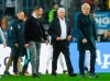 Dietmar Hopp, center, patron of TSG 1899 Hoffenheim, and former soccer player and board member of FC Bayern Munich, Oliver Kahn, leave the field after the German Bundesliga soccer match between TSG Hoffenheim and FC Bayern Munich in Sinsheim, Germany, Saturday, Feb. 29, 2020. (Tom Weller/dpa via AP)