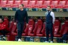 Bayern's head coach Hans-Dieter Flick, left, and sport director Hasan Salihamidzic watch their team during the German Bundesliga soccer match between FSV Mainz and FC Bayern Munich in Mainz, Germany, Saturday, April 24, 2021. (AP Photo/dpa via AP)