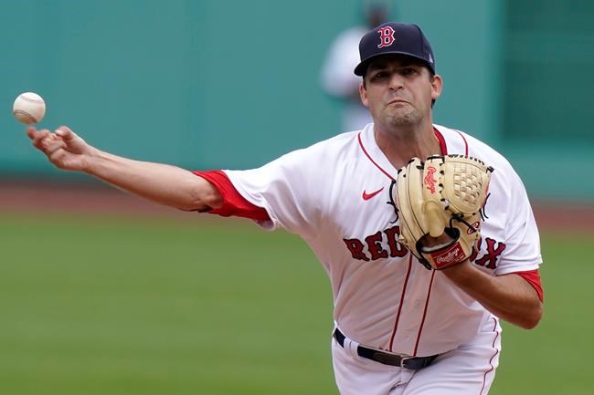 Boston Red Sox's Andrew Triggs delivers a pitch against the Toronto Blue Jays in the first inning of a baseball game, Sunday, Sept. 6, 2020, in Boston. (AP Photo/Steven Senne)