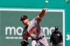 Baltimore Orioles' Bruce Zimmermann delivers a pitch against the Boston Red Sox during the first inning of a baseball game, Sunday, April 4, 2021, in Boston. (AP Photo/Steven Senne)