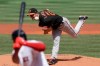 Baltimore Orioles' Wade LeBlanc delivers a pitch agains the Boston Red Sox during the first inning of a baseball game, Sunday, July 26, 2020, in Boston. (AP Photo/Steven Senne)