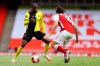 Watford's Abdoulaye Doucoure, left, drives against Arsenal's Dani Ceballos during the second half of the English Premier League soccer match between Arsenal and Watford at Emirates Stadium in London, England, Sunday, July 26, 2020. (AP photo/Julian Finney, Pool)